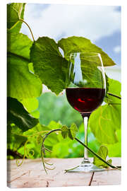 Canvas print  Glass of Red Wine in Vineyard